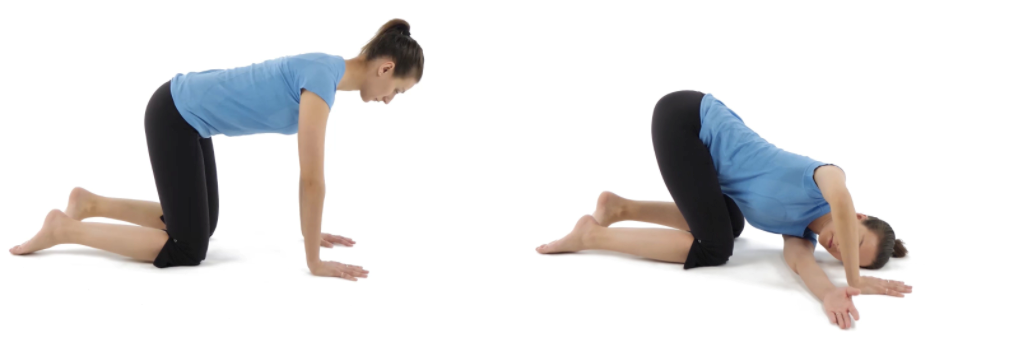 A woman doing a thread the needle exercise