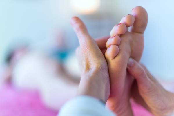 toes rubbing feet